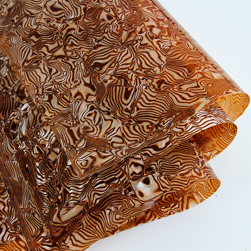 廠家直銷賽璐珞板材貝殼理石貝殼理石手風琴鼓皮樂器貼面飾品建材家具裝飾廠家直銷賽璐璐訂制-九江賽璐珞實業有限公司